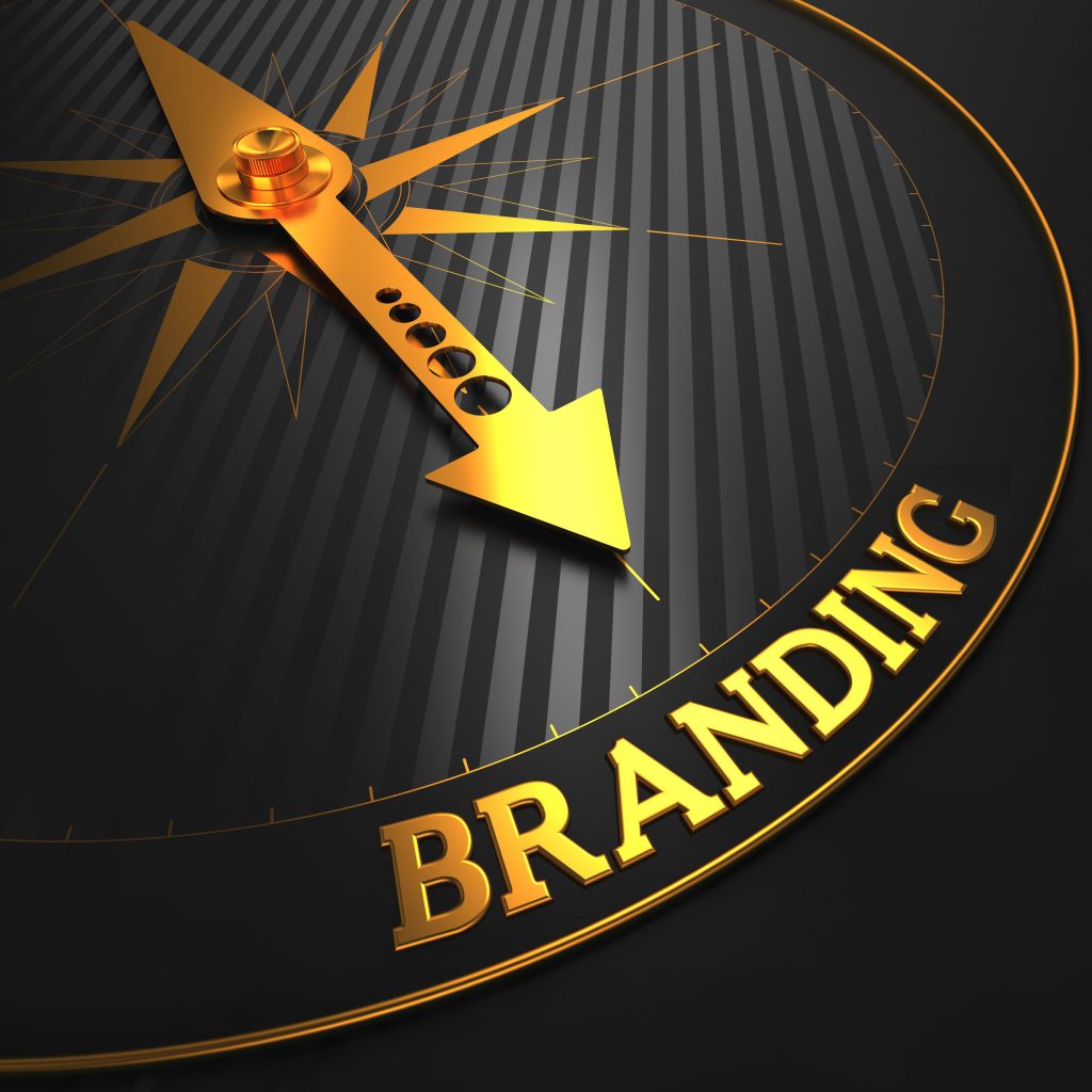 Branding - Business Concept. Golden Compass Needle on a Black Field Pointing to the 