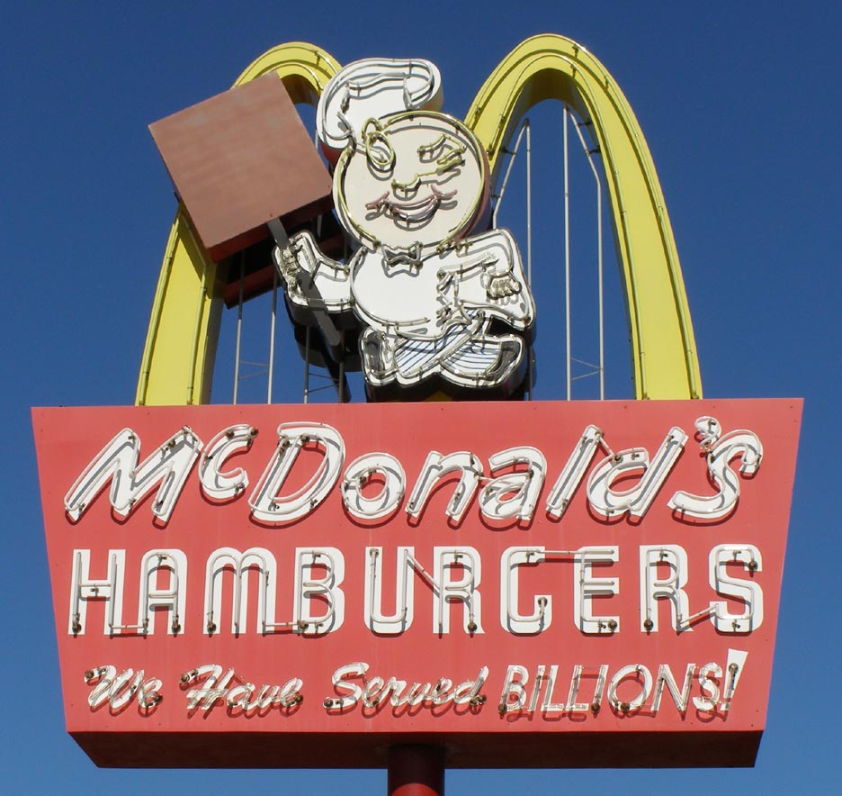 McDonalds old sign with served billions slogan